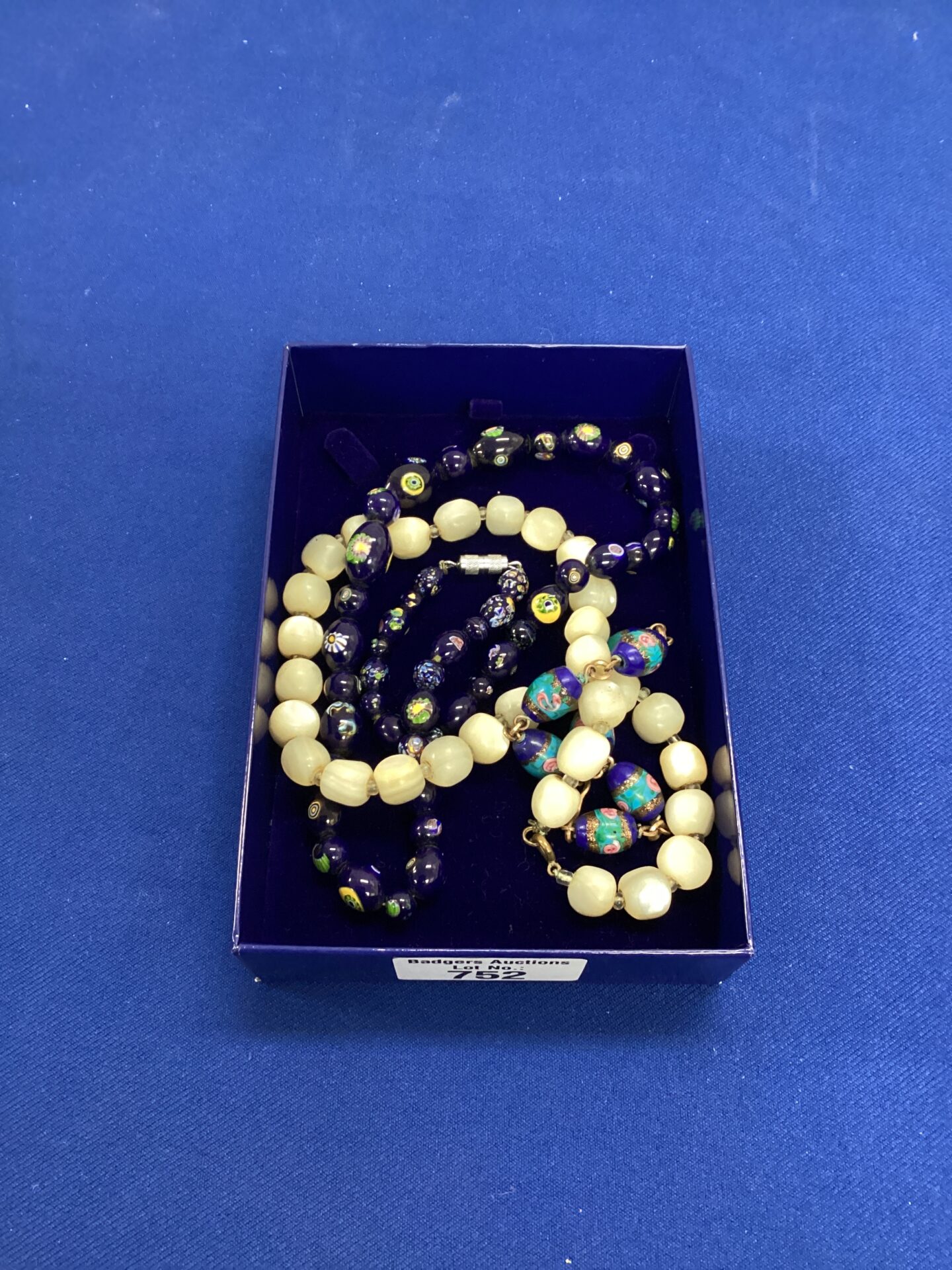 803 Tray with two vintage necklaces inc Murano