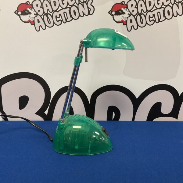 Vintage green extendable desk lamp with adjustable arm.