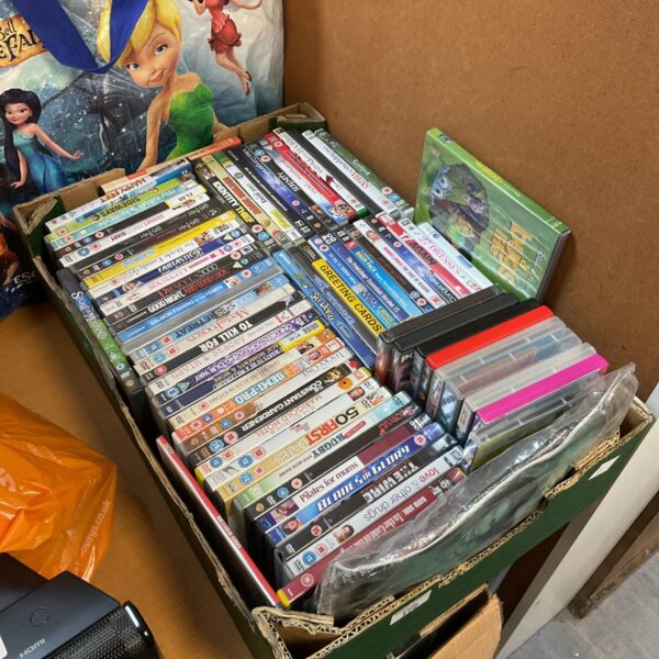 Tray of Disney DVDs for family entertainment.