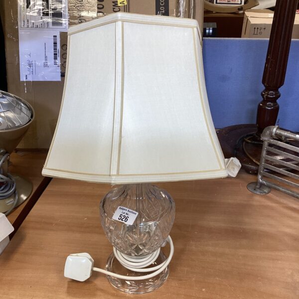 Vintage cut glass table lamp with a clear glass base.