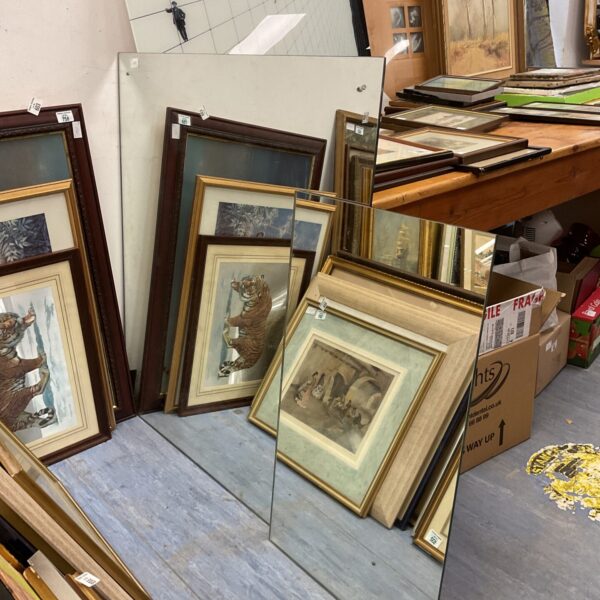 Antique mirror collection with ornate gilt frames.