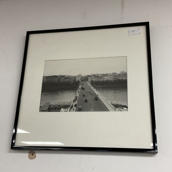 Vintage monochrome photograph of London Bridge street scene.