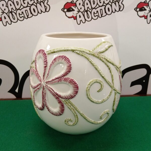 White Villeroy & Boch floral ceramic vase for display.