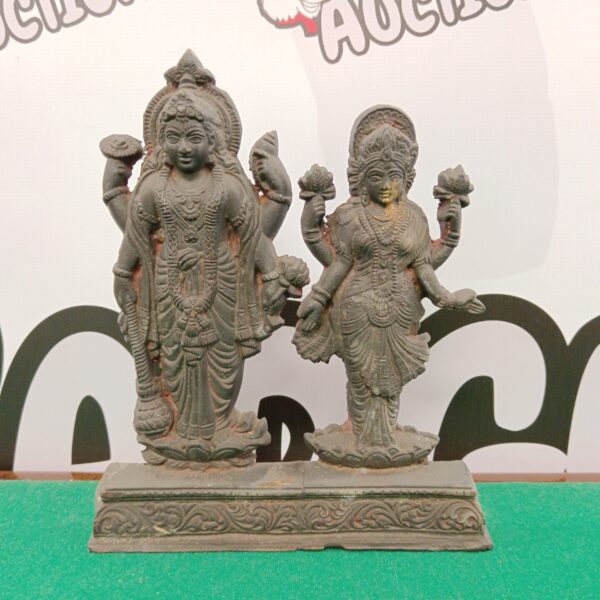 Vintage brass Indian Vishnu figure, detailed Hindu deity sculpture.