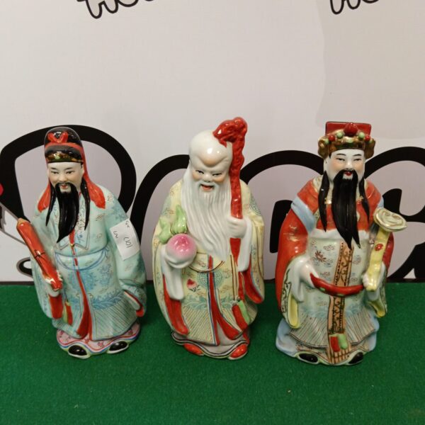 Group of three vintage porcelain Chinese wise man figures.