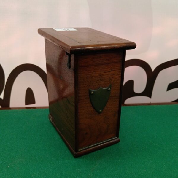 Front view of a vintage wooden communication box.
