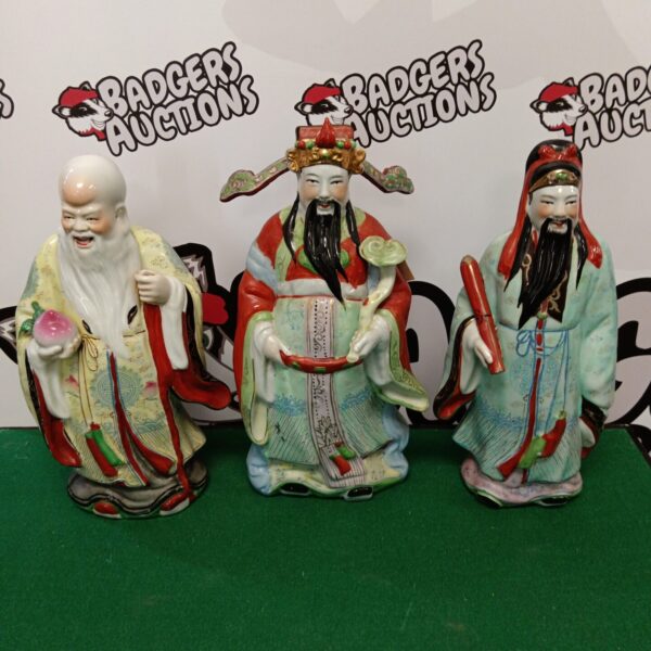 Group of three vintage Chinese wise man ceramic figures.