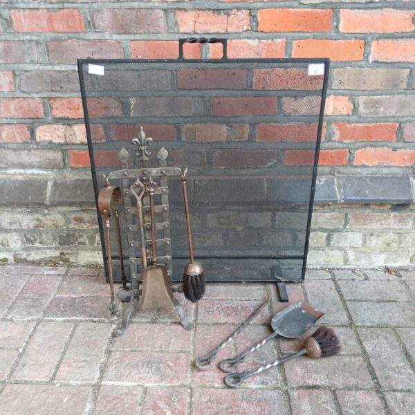 Vintage wrought iron fireplace companion set with fire screen.