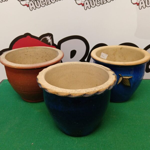Lot of three colourful stoneware plant pots for garden use.