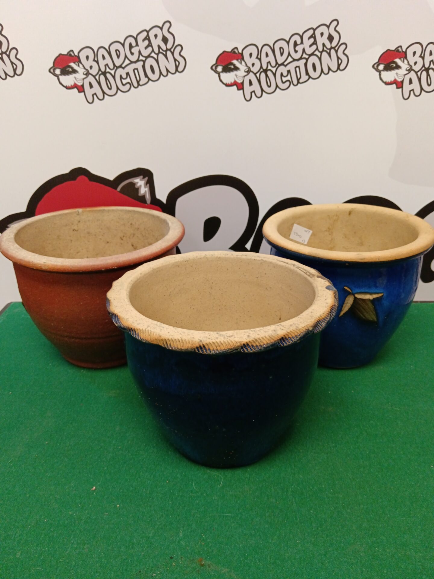 069 Three stoneware glazed plant pots