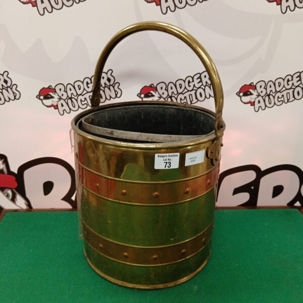 Vintage brass and copper coal bucket for fireplace use.
