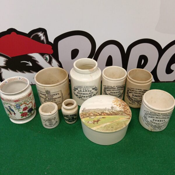 Vintage stoneware marmalade pots with branded details, collectible kitchenalia.