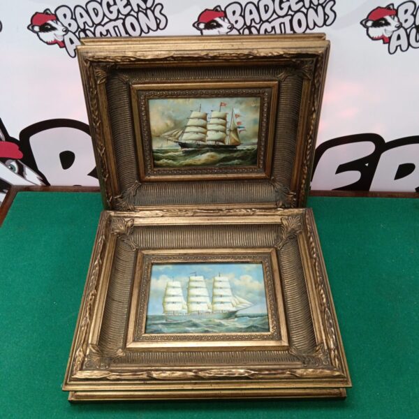 Antique oil painting of a sail ship in a gilt frame.
