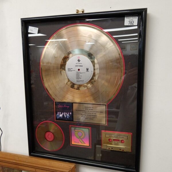 Gold RIAA sales award for Gipsy Kings Elektra Entertainment album.
