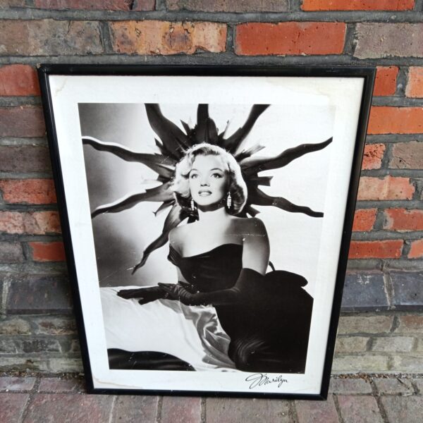 Vintage black and white Marilyn Monroe photographic print in a frame.
