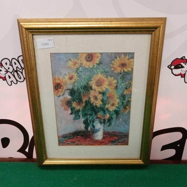 Gilt framed Van Gogh sunflowers print for wall decor.
