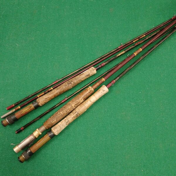 Lot of three vintage fly fishing rods with cork handles.