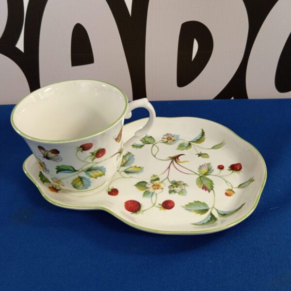 Vintage James Kent Staffordshire cup and saucer with floral design.