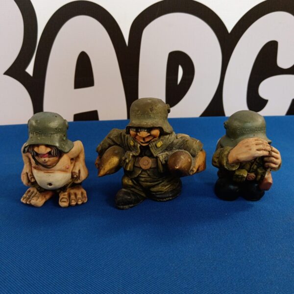 Vintage lot of three artefice soldier figures.