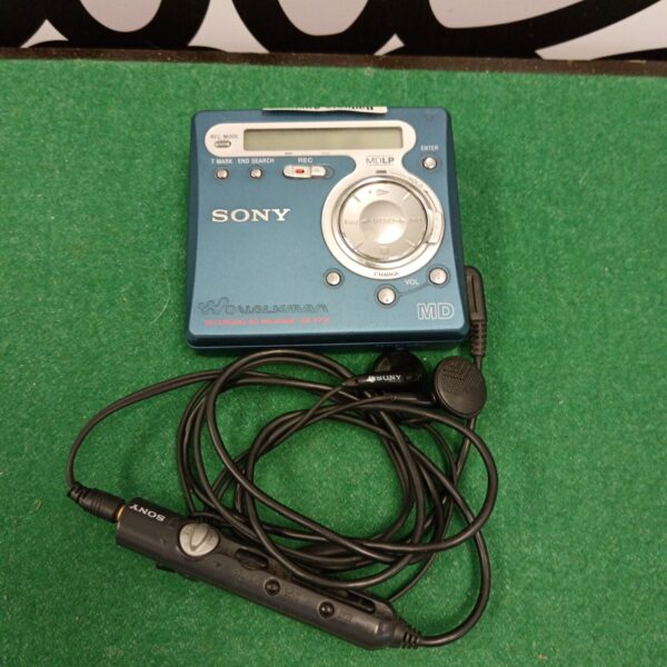 Vintage Sony MZ-R700 minidisc player with headphones for portable audio.