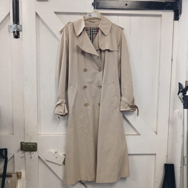Vintage beige trench coat size 10, classic outerwear.