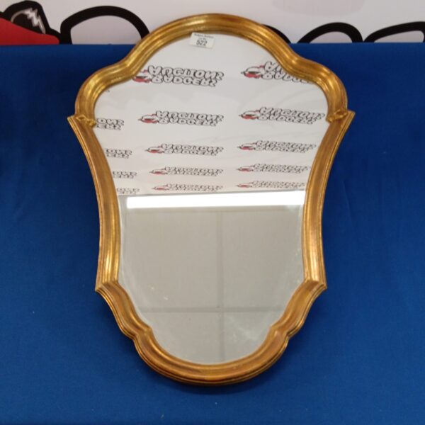 Small gilt framed French style boudoir mirror for vanity.