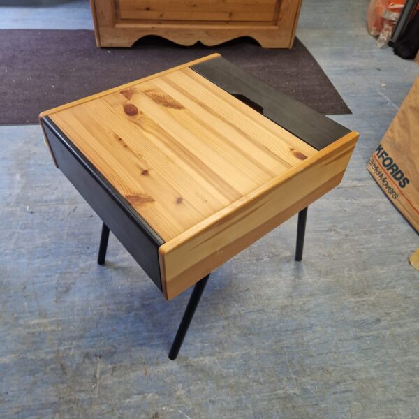 Small pine drawer with a simple, rustic design.