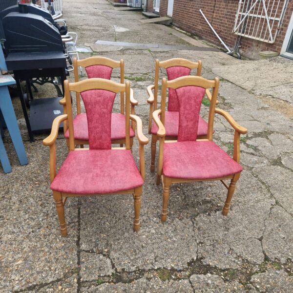 Four pink carver dining chairs