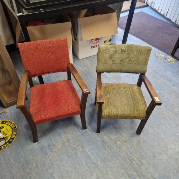 Pair of vintage childs chairs with patterned upholstery.