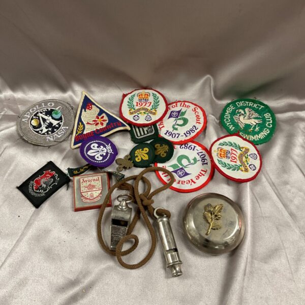 Vintage scout badges and whistle collection, colourful and collectable.