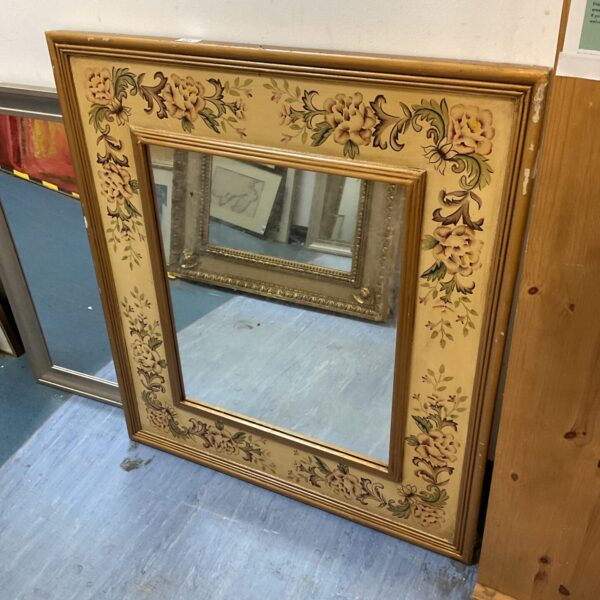 Large vintage floral framed mirror for wall decoration.