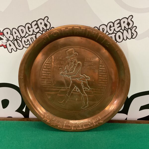 Vintage Johnnie Walker copper serving tray with embossed logo.
