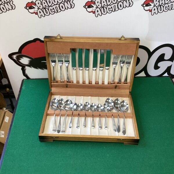 Vintage boxed canteen of cutlery with silver plated flatware inside.