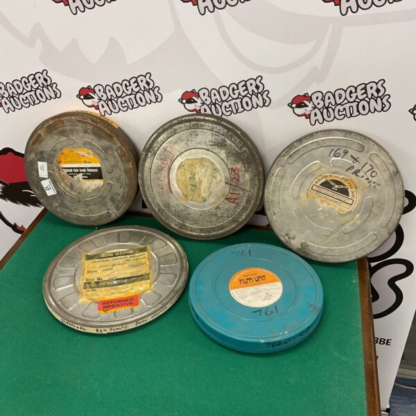 Lot of six vintage film reel cans for collectors.