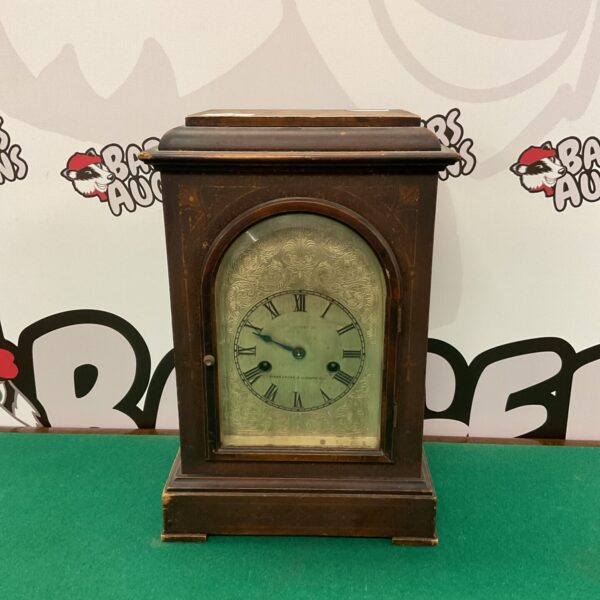 Front view of antique Bravington mantle clock with Kings Cross & Ludgate Hill branding.