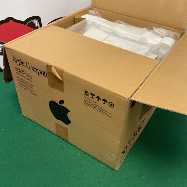 Front view of vintage Apple Stylewriter printer in original box.
