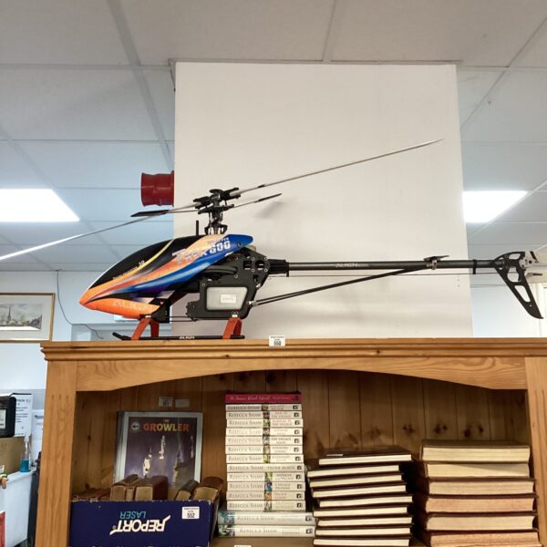 Red and black Mitrepro T-Rex 600 RC helicopter for sale.