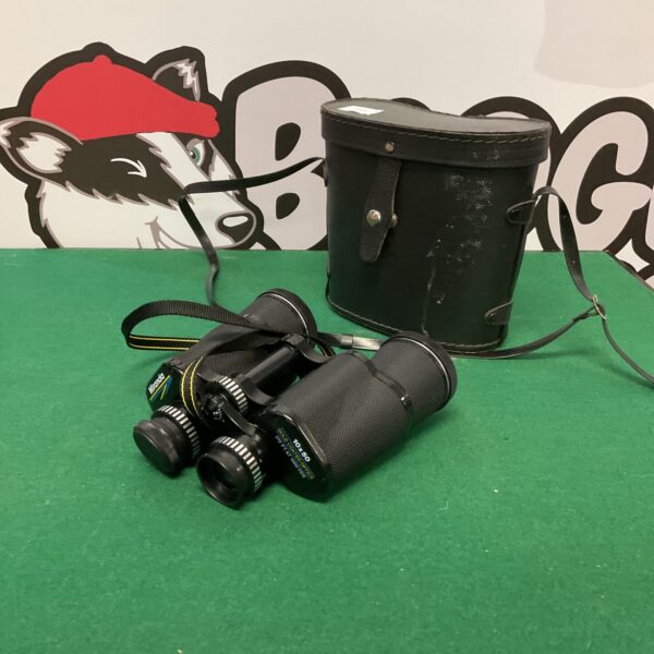 Vintage Miranda 10x50 binoculars with gold coated optics on display.