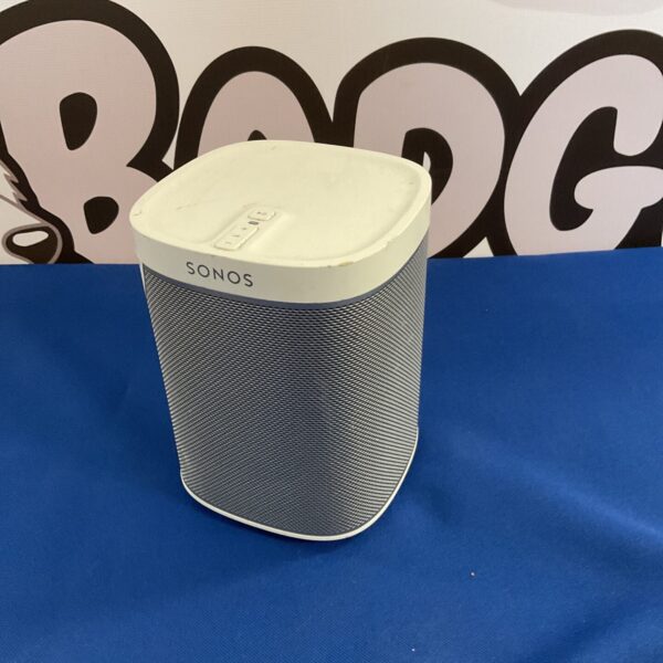White Sonos Play 1 wireless smart speaker on a patterned background.