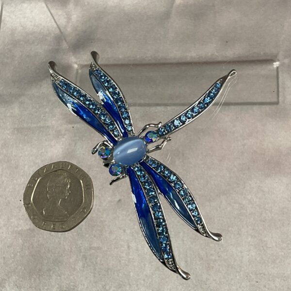 Vintage blue dragonfly brooch with enamel detailing.