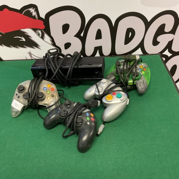 Lot of Xbox and GameCube controllers for retro gaming.