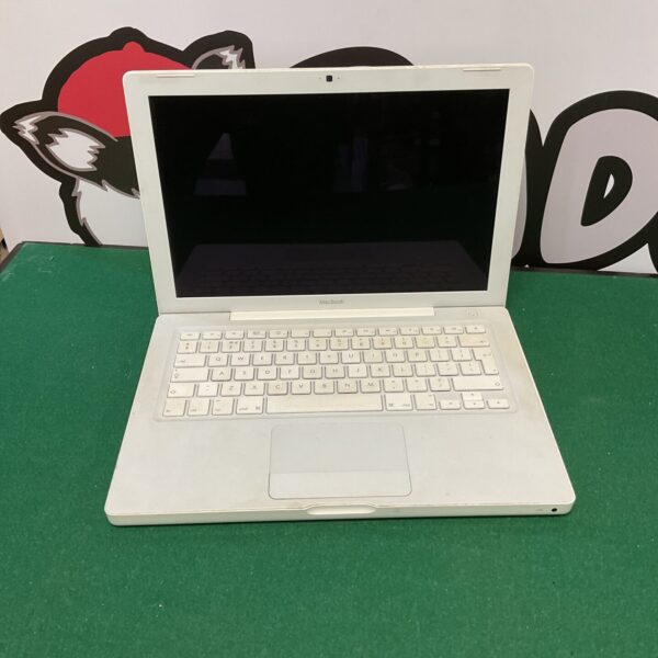 Vintage Apple Macbook laptop, silver finish, closed view.