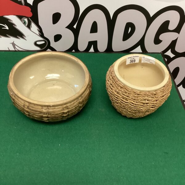 Pair of handmade woven craft bowls for rustic home decor.