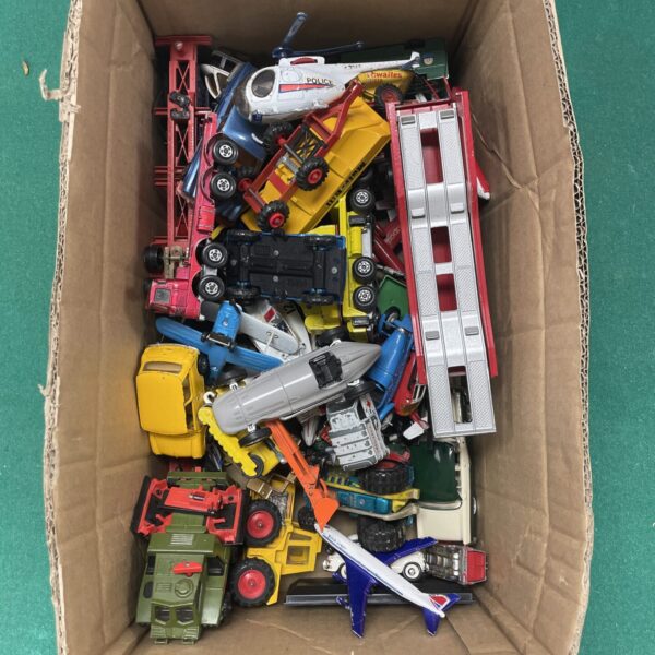 Vintage diecast vehicle lot with Matchbox and Corgi toy cars.