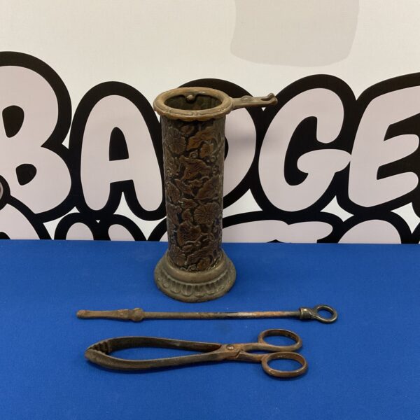Vintage copper fireplace companion set with floral designs.
