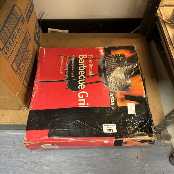 Used Asda 35cm portable barbecue for outdoor cooking.