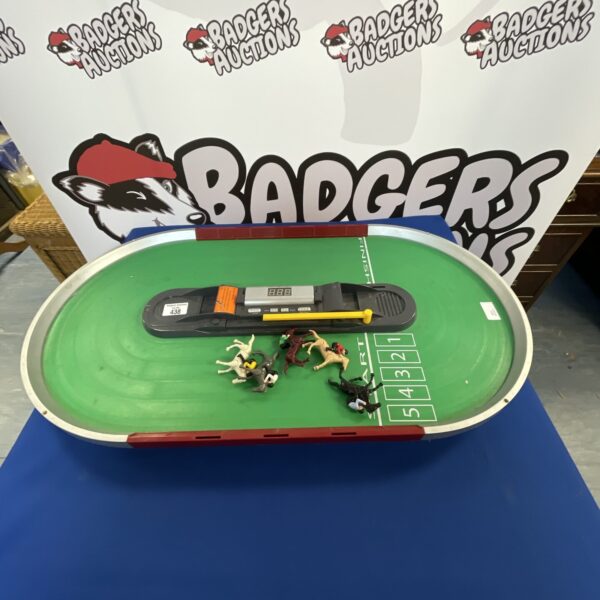 Vintage magnetic horse racing game with colourful track.