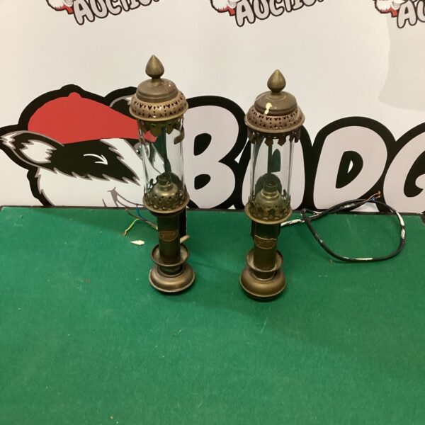 Pair of vintage GWR brass railway lamps, showing wear.