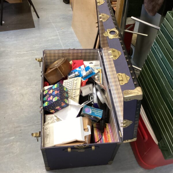 Blue vintage travel trunk filled with a house clearance mixed lot.