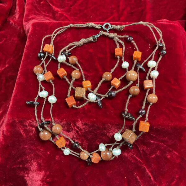 Colourful pearl, gold stone and amethyst beaded necklace and bracelet set.